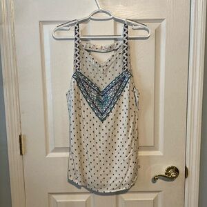 Skies are Blue women’s size XL top. Fun cut out in back (see pics). No damages.